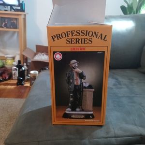 Porcelain clown figure.